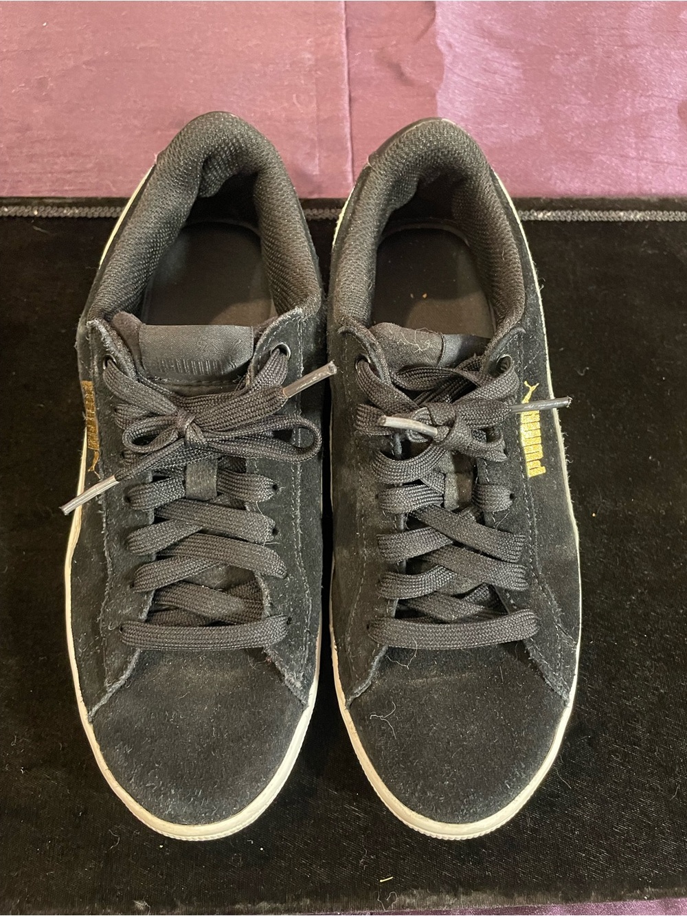 Puma Black Suede Low-Top Sneakers with Gold Branding